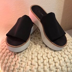 LAST CHANCE!! Black slide sandals with white wedge.